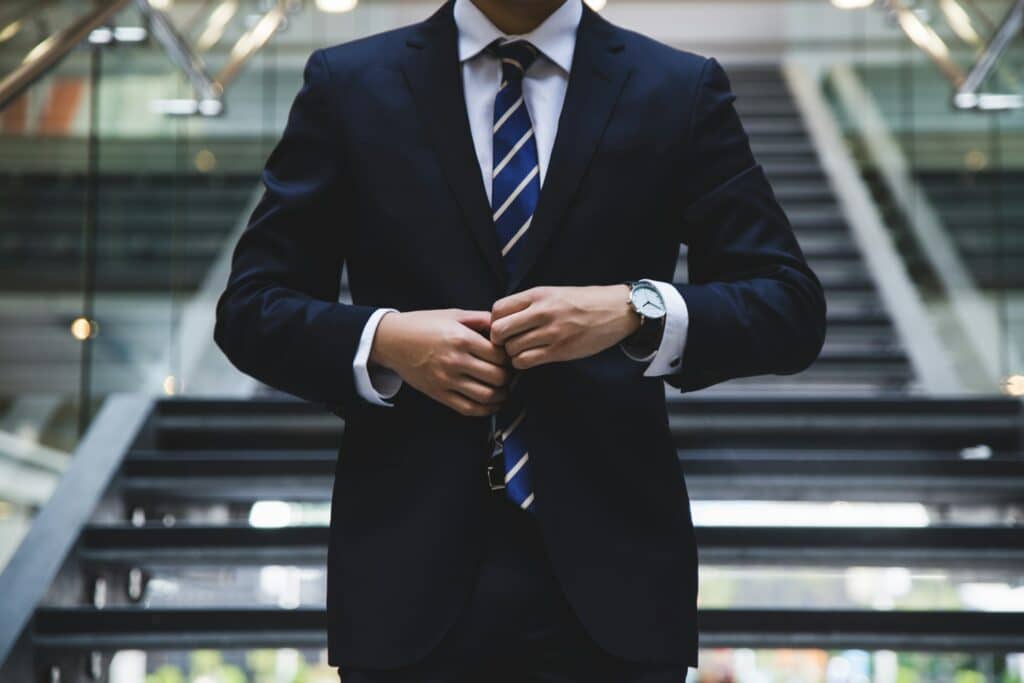 A lawyer type business person in a sharp suit